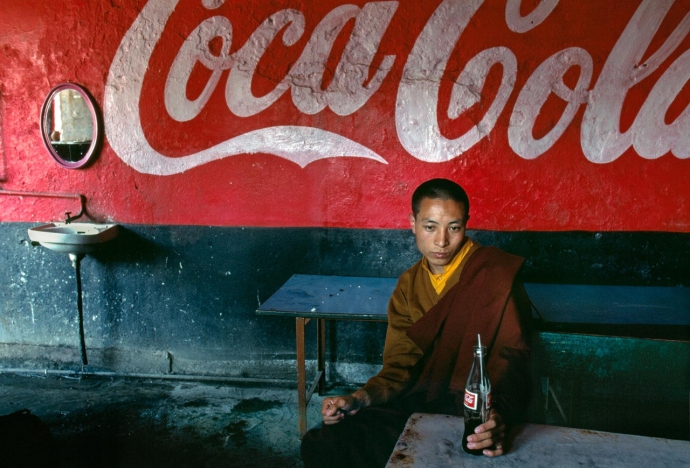2765 Steve McCurry  Young Monk at Tea Shop, India   (2000).jpg